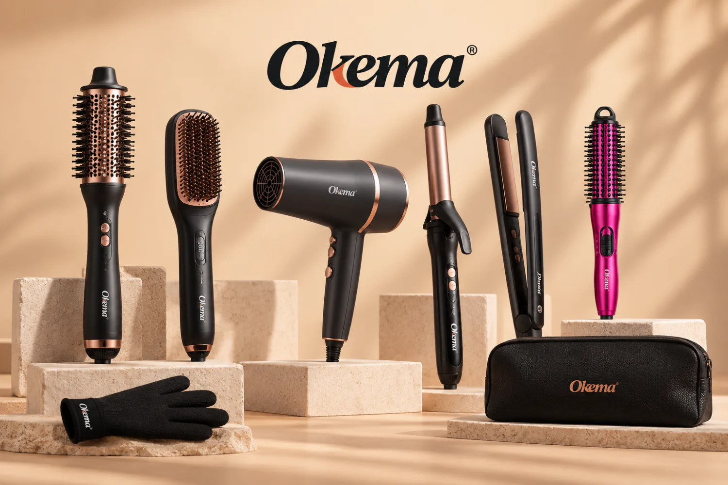 The full Okema range — volumising brushes, a dryer, a curling wand, straighteners, a glove and a travel case — arranged on travertine plinths.